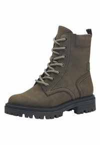 Brown leather ankle boots featuring a lace-up design, padded collar, and textured rubber sole with deep treads for traction.