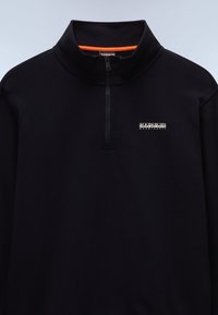 Black pullover with a quarter-zip collar, featuring orange accent inside. Logo printed on the left chest. Soft fabric texture.