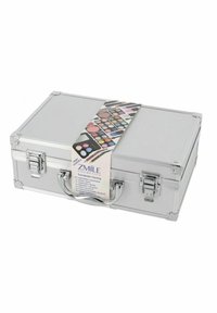 Silver aluminum makeup case with textured surface, metal hardware, and handle; features a label listing included cosmetic items and shades.