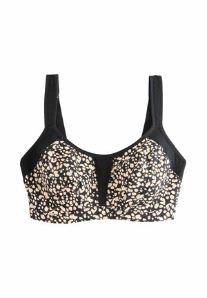 Wireless black bra with spotted beige and cream patterns, mesh detailing on sides, and adjustable straps for support and comfort.