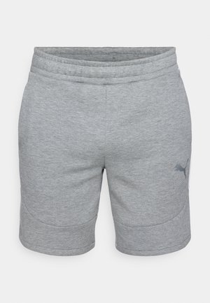 Halli spordilühikesed pehmest kangast, elastse vöökoha ja külgmise logo aktsendiga. Sile tekstuur, sirge lõige, põlvekõrgune.