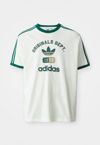 White short-sleeve t-shirt with green accents, featuring "ORIGINALS DEPT." and "adidas" graphics, and a vintage-style logo from 1972.