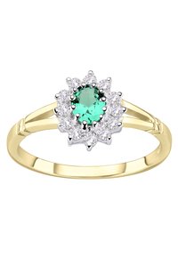 Kuld sõrmus, mille keskel roheline kalliskivi, mida ümbritseb valgete kalliskivide halo, kinnitatud hõbedast küünistega. Sile vöö koos poleeritud viimistlusega.