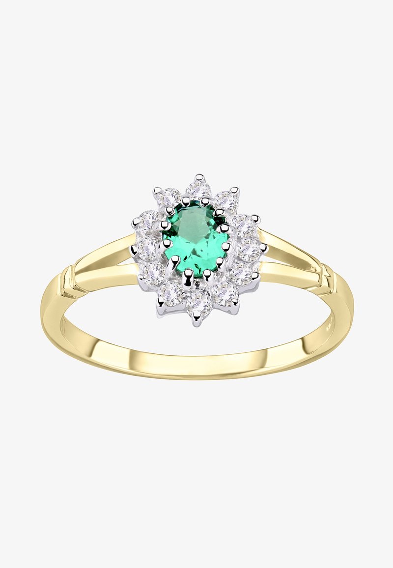 Kuld sõrmus, mille keskel roheline kalliskivi, mida ümbritseb valgete kalliskivide halo, kinnitatud hõbedast küünistega. Sile vöö koos poleeritud viimistlusega.