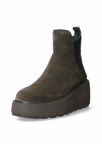 Stivale alla caviglia in suede verde con una suola platform spessa, pannelli laterali elastici e una linguetta sul retro per indossarlo facilmente. Design con punta rotonda.