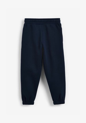 Granatowe dresy wykonane z miękkiego materiału, z elastycznym paskiem w talii, ściągaczami przy nogawkach i luźnym krojem dla komfortu.