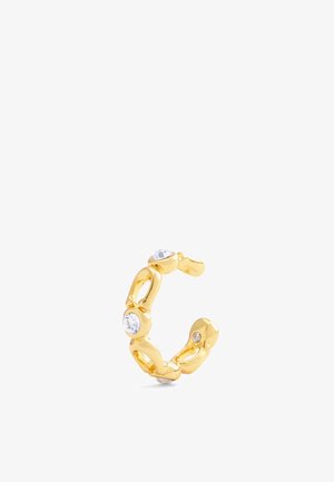 Gold-tone hoop earring featuring linked shapes with clear gemstones set at intervals. Smooth, shiny surface with a modern design.