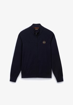 Chaqueta con cremallera de color navy con una sección superior texturizada, puños y dobladillo acanalados. Presenta un parche con un logo redondo en el lado izquierdo del pecho. Material de punto suave.