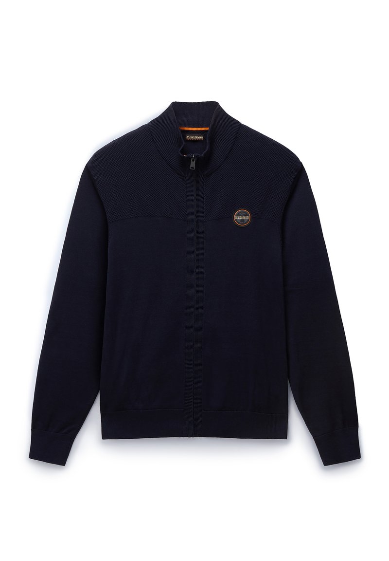 Veste zippée marine avec une section supérieure texturée, des poignets et un ourlet côtelés. Dotée d'un patch logo rond sur la poitrine gauche. Matériau en tricot doux.