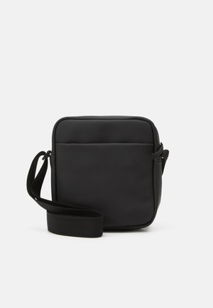 UNISEX - Cross body bag - black
