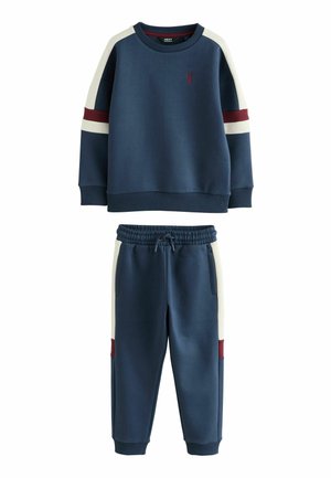 Dunkelblaues Sweatshirt- und Jogginganzug-Set mit weißen und kastanienbraunen Streifen an den Ärmeln und Hosenbeinen, elastischen Bündchen und verstellbarem Bund.