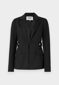 Blazer noir ajusté avec revers crantés, deux poches avant à rabat et boutons décoratifs dorés sur les pattes latérales, suspendu contre un fond blanc.