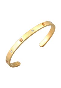 Bracciale in oro con finitura liscia, abbellito da accenti emblematici rossi e gemme trasparenti per un sottile luccichio.