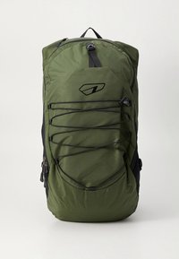 Green nylon backpack with a black accent, featuring a bungee cord design on the front, adjustable straps, and dual zippered pockets.