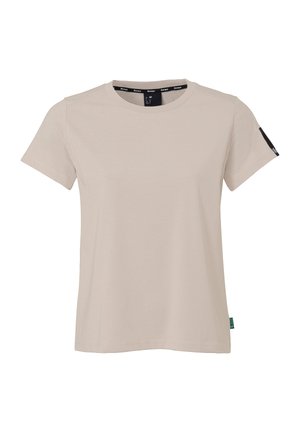 Beige t-shirt met korte mouwen van zacht materiaal, met een ronde halslijn en een contrasterend zwart label op de linkermouw.