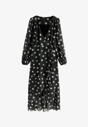 Črna obleka z dolgimi naborkami, ki ima globok V-izrez in bele krožne vzorce. Narejena iz lahkotnega, prosojnega materiala z zavezovanjem v pasu.