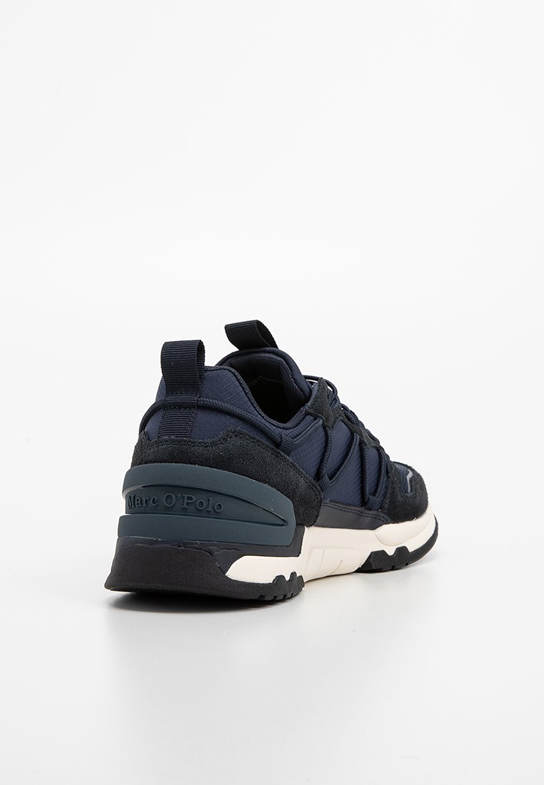Granatowe buty sportowe z siateczki i zamszu, z amortyzowaną podeszwą, wzmocnionym piętą oraz markowym logo "Marc O'Polo" z boku.
