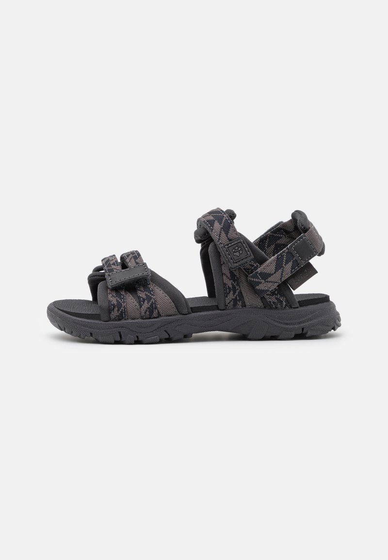 Black and gray sandals featuring a textured outsole, adjustable straps, and patterned fabric accents. Lightweight with an open design.