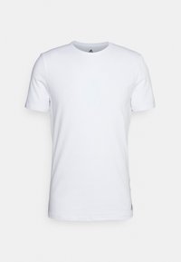 T-shirt en coton blanc à manches courtes avec un col rond. Présente un petit logo noir en bas à gauche de l'ourlet. Texture lisse, coupe classique.