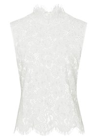 Haut sans manches en dentelle blanche avec motifs floraux et bords festonnés à l'ourlet et au col.