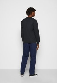 Carhartt WIP CALDER PANT - Calças - dark navy rinsed