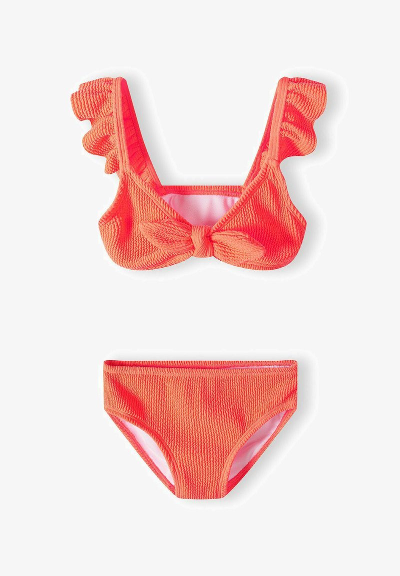 Two-piece bikini set in bright coral. Top features ruffled straps and front bow detail, while the bottom has a classic cut with textured fabric.