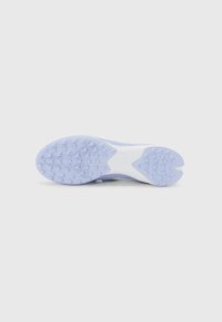 Sole of a shoe in light purple with textured grip pattern, featuring a white accent. Smooth finish with slight sheen and tapered shape.