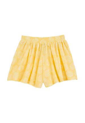 Pantalones cortos amarillos con estampados de conchas blancas, con un diseño de falda con volantes y una cinturilla elástica para mayor comodidad y fácil uso.