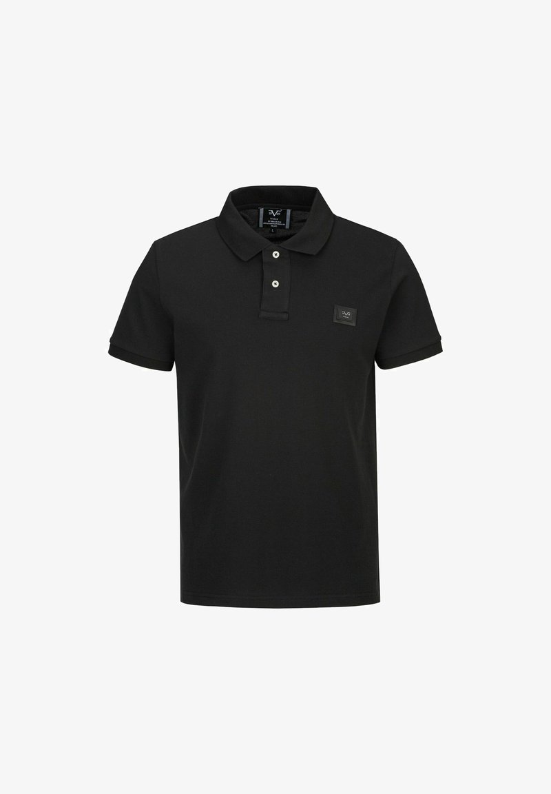 Schwarzes Poloshirt aus einem glatten Stoff, mit einer Knopfleiste aus zwei Knöpfen und kurzen Ärmeln. Enthält ein kleines Logopatch auf der Brust.