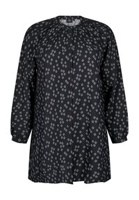 Blouse noire à motifs, ornée de motifs en losange blancs, à manches longues, col rond et fermeture à boutons avec un détail froncé.