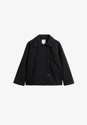 Black wool coat with a notched collar, raglan sleeves, front buttons, and side pockets; smooth texture and simple design.