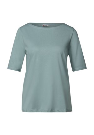 Top a maniche corte di colore azzurro chiaro, realizzato in tessuto liscio, con scollatura rotonda e vestibilità rilassata, caratterizzato da semplici dettagli di cucitura.