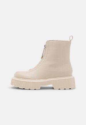 Bottines à plateau - off-white