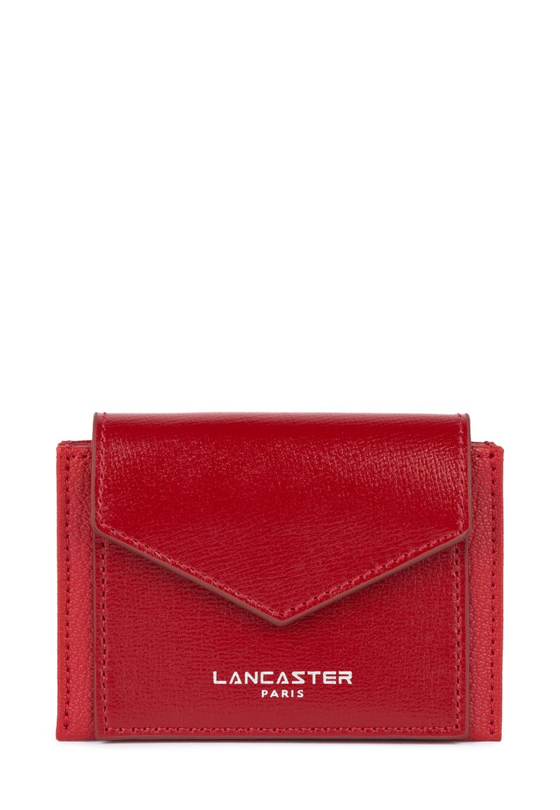 Red leather wallet with a textured finish, featuring a triangular flap closure, embossed "Lancaster Paris" logo, and compact rectangular shape.