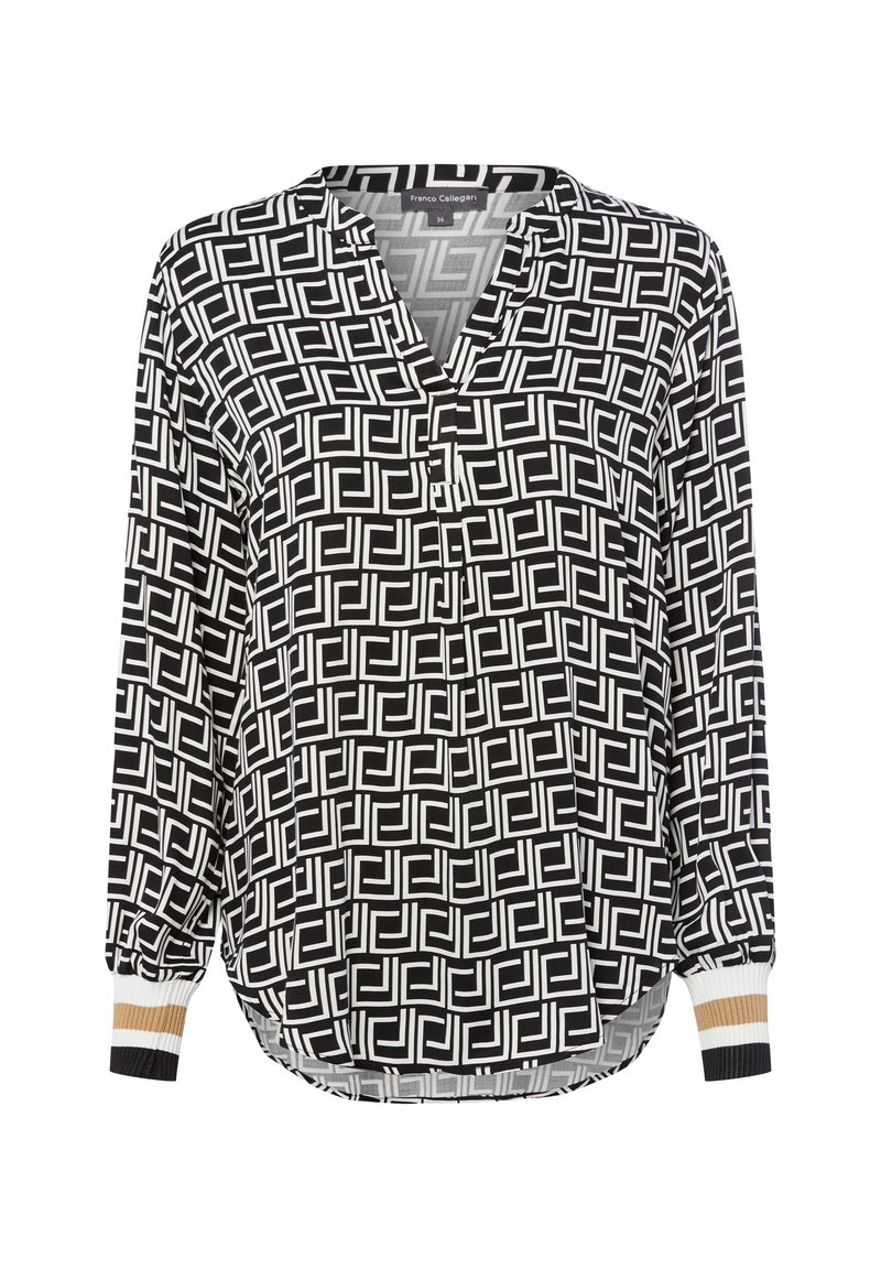 Langärmelige Bluse mit schwarz-weißen geometrischen Mustern, einem gespaltenen Ausschnitt und gerippten Bündchen, die weiße, beige und schwarze Streifen aufweist.