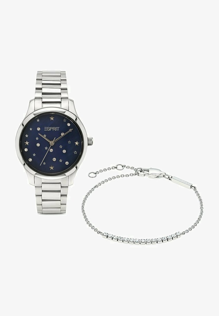 Montre-bracelet en argent avec un cadran bleu marine, agrémenté d'étoiles et d'accents en cristal, accompagné d'un délicat bracelet en argent.