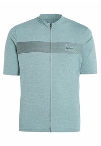 Chemise à manches courtes zippée bleu clair avec un motif texturé et des rayures noires horizontales sur la poitrine. Petit logo sur le côté gauche.