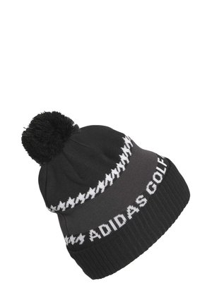 Black knit beanie with a pom-pom on top, featuring white "ADIDAS GOLF" text and a contrasting zigzag pattern near the brim.