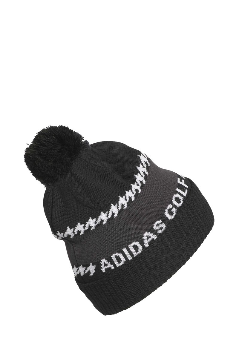 Berretto in maglia nera con pompon in cima, con testo bianco "ADIDAS GOLF" e un motivo zigzag contrastante vicino al bordo.