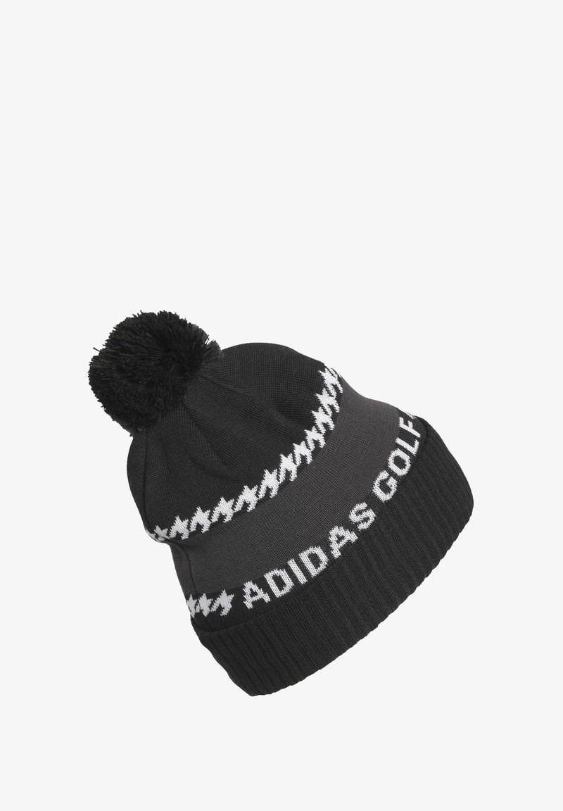 Gorro de punto negro con un pompón en la parte superior, que presenta el texto blanco "ADIDAS GOLF" y un patrón de zigzag en contraste cerca del borde.