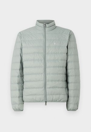 Light green puffer jacket with a high collar, zip closure, and horizontal quilted pattern. Features a small logo on the chest.