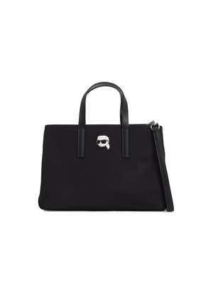 Black tote bag made of smooth fabric with leather handles. Features a front character accent and a detachable shoulder strap.