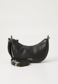 Black leather shoulder bag with rounded shape, gold-tone zipper, and logo detail on the front. Adjustable strap included.