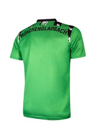 Groen T-shirt met korte mouwen en contrasterende zwart-witte accenten. "MÖNCHENGLADBACH" gedrukt op de achterkant, overall een gladde textuur.