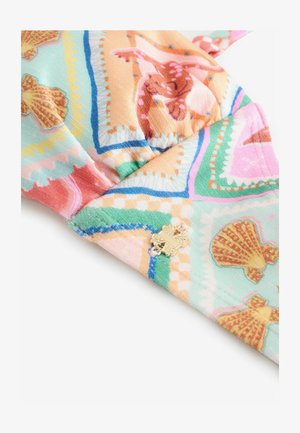 Colorful fabric with a pattern of seashells and swirls in pastel shades, featuring a gold accent detail. Textured surface with a soft finish.