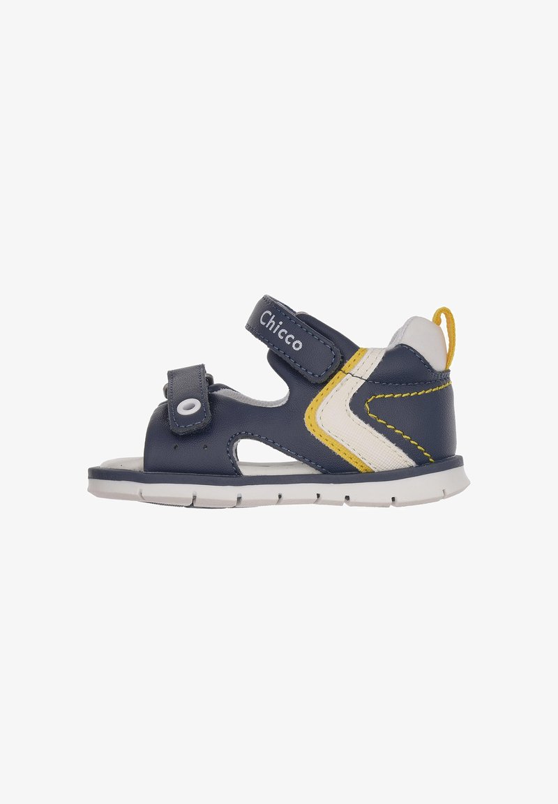 Navy blue leather sandal with white and yellow accents, Velcro straps, and rubber sole. Open design for breathability.