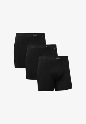 Boxer briefs negros hechos de algodón. Presentan un ajuste ceñido, una cinturilla elástica y un sutil acento de logo rojo. Se exhiben tres pares.