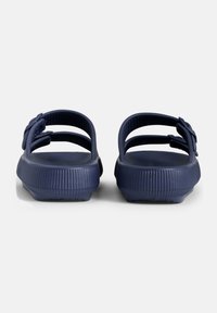 Navy blue rubber sandals with two straps, contoured footbed, and textured sole. Features a smooth finish and a slight heel for comfort.