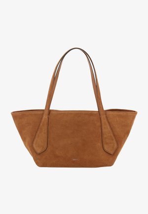 Brown suede tote bag with a tapered base, two elongated handles, and a smooth, soft texture. Features minimalistic design with no visible hardware.