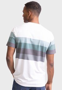 Short-sleeve, crew-neck t-shirt with horizontal stripes in teal, gray, and white. Cotton fabric with a smooth texture and relaxed fit.